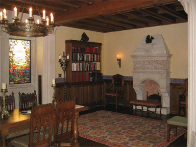 Tudor Gothic style Library with oak paneled wainscot