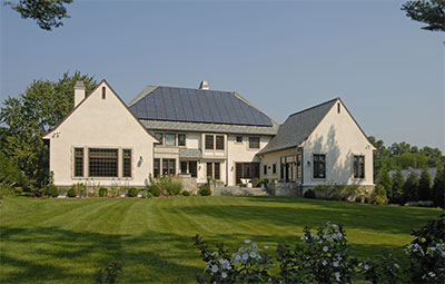 Rear Facade with Photovoltaic Solar Panels on Slate Roof