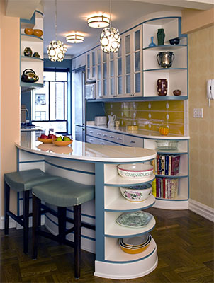 The Streamline Moderme building inspired the custom cabinet design